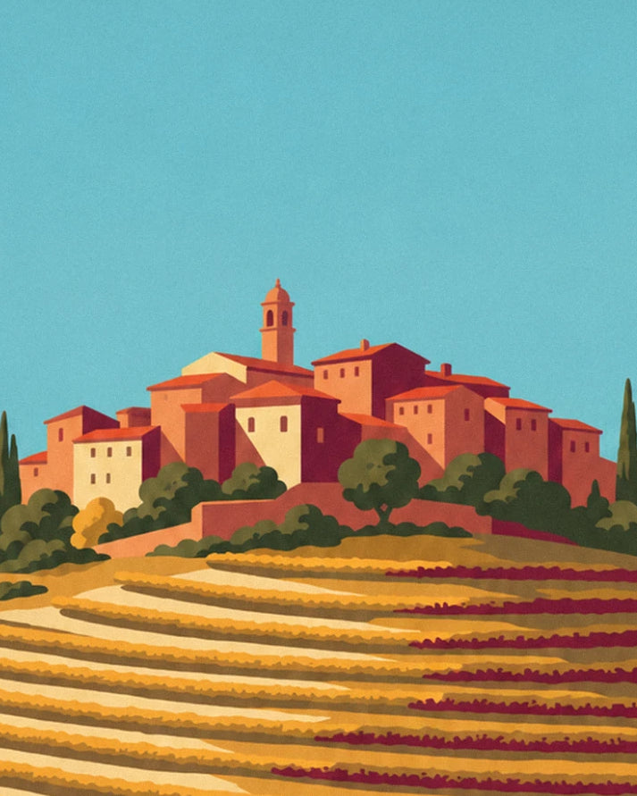 The village with orange tiled roofs and its bell tower perched above the golden vineyards