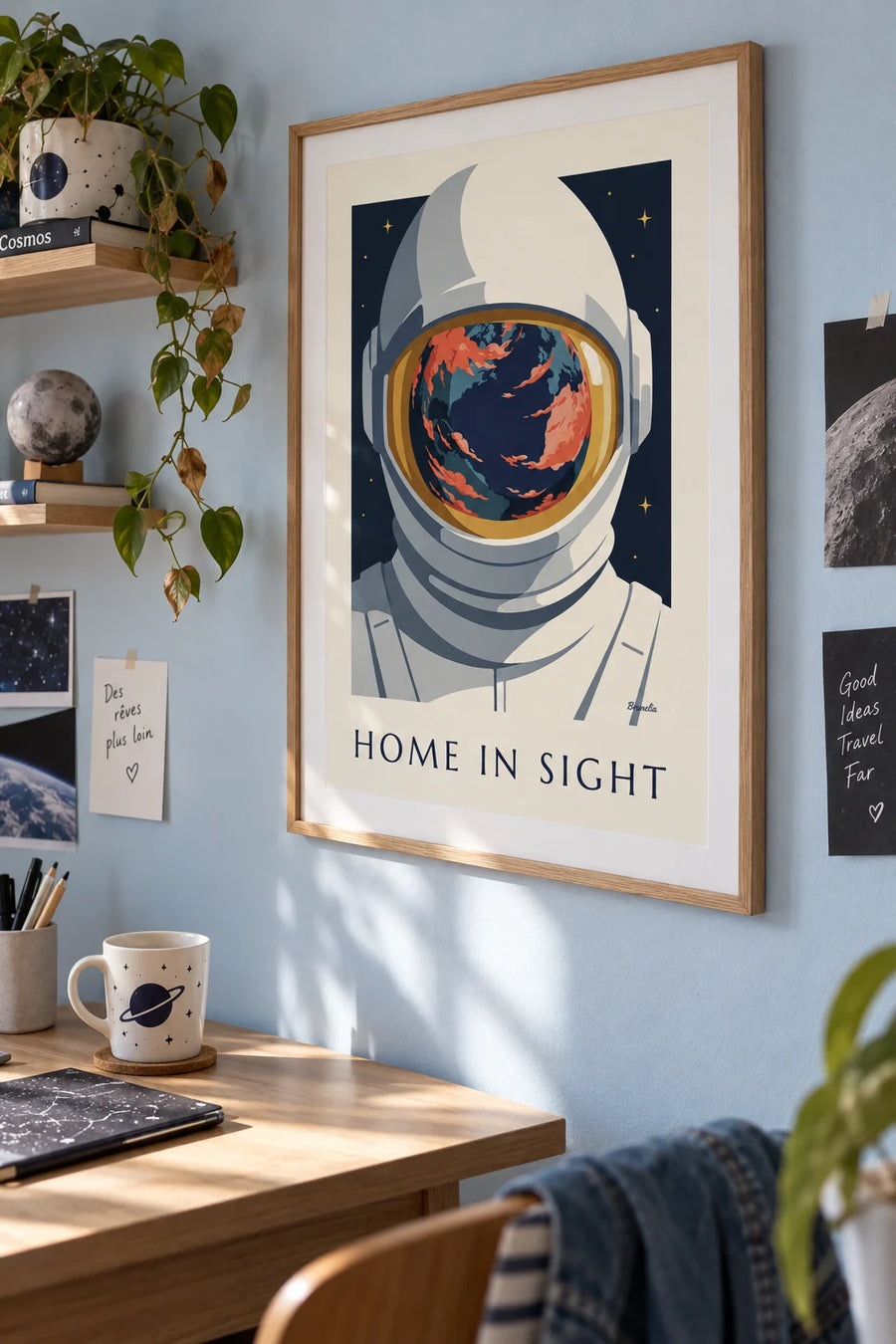 Poster of the Earth reflected in an astronaut’s helmet: framed on the wall