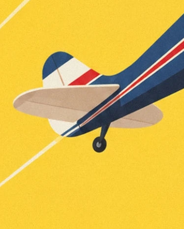 The blue plane’s tail with red and white stripes and its small wheel