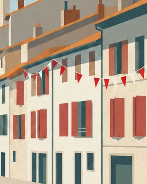 Les maisons aux volets rouges et leurs guirlandes de fanions au bord de la Nive