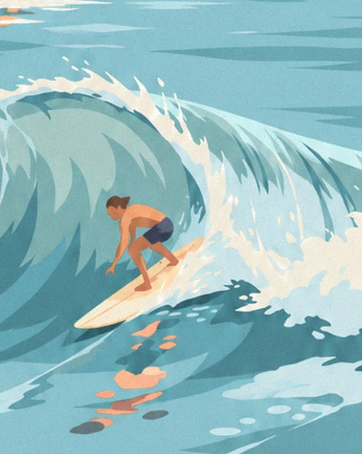 The surfer in navy blue shorts riding inside a turquoise wave, with a cream board beneath his feet