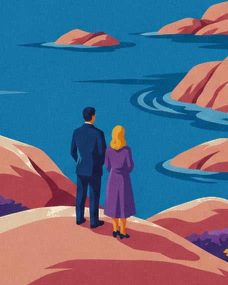 The couple facing the sea on a pink rock, him in a blue suit and her in a purple coat