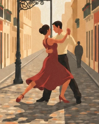 A tango couple in a red dress and pale shirt, on the cobbled street in San Telmo