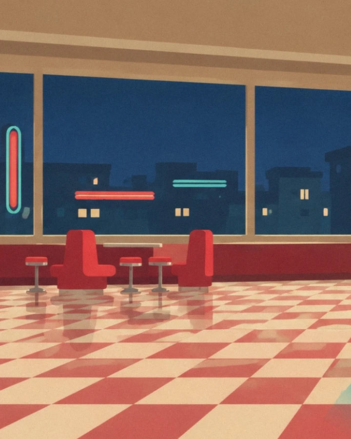 Red booth seats in front of large windows and a red and cream chequered floor