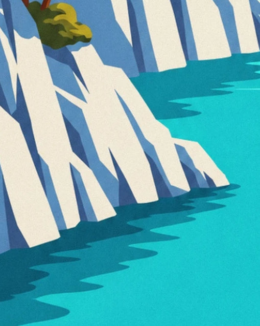 The foot of the white cliffs and their dark shadows on the turquoise water