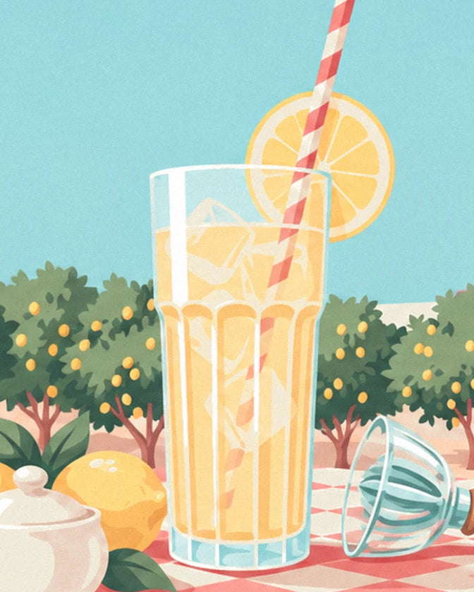 Le grand verre de citronnade glacée, sa paille rayée rose et sa rondelle de citron