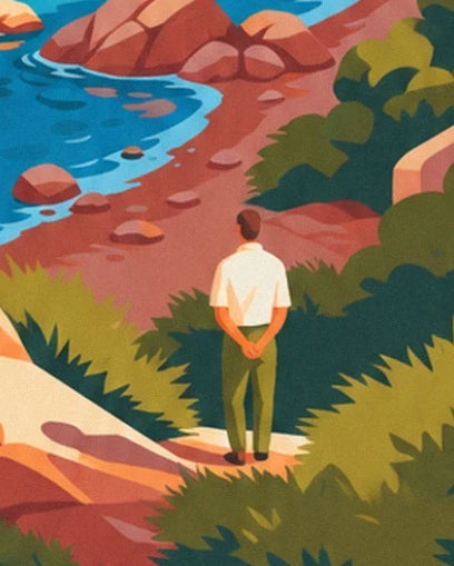 A man seen from behind, with his hands behind his back, facing the cove lined with pink rocks