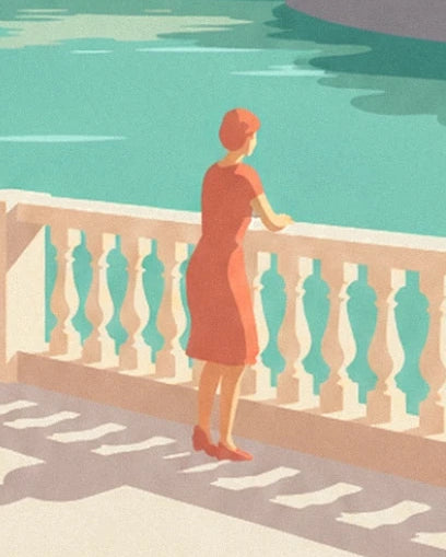 Une femme en robe rouge accoudée à la balustrade claire, face à l’eau turquoise