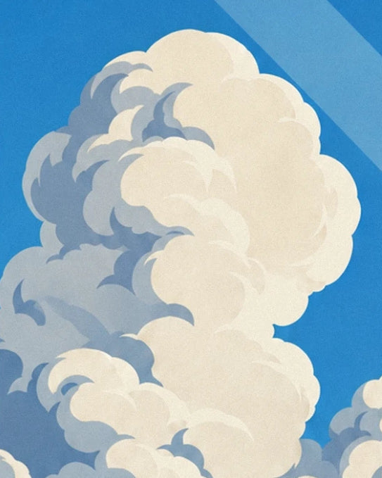 Large cream cumulus clouds with blue-grey shadows, in a vivid blue sky
