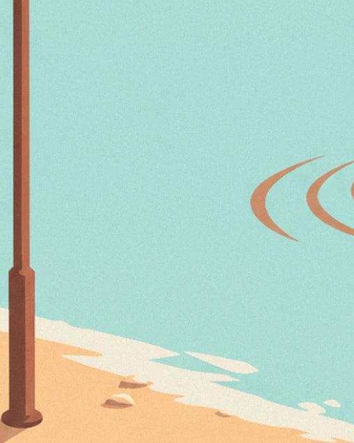 The brown lamppost on the golden sand, with foam edging the clear water