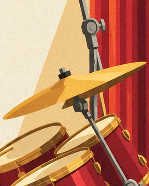 The golden cymbal on its grey stand above the red drums