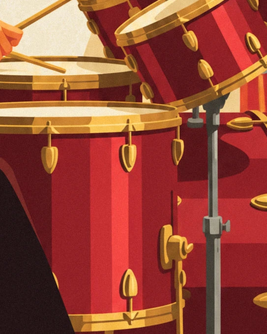 The red drums with golden hoops, drumsticks and a grey stand