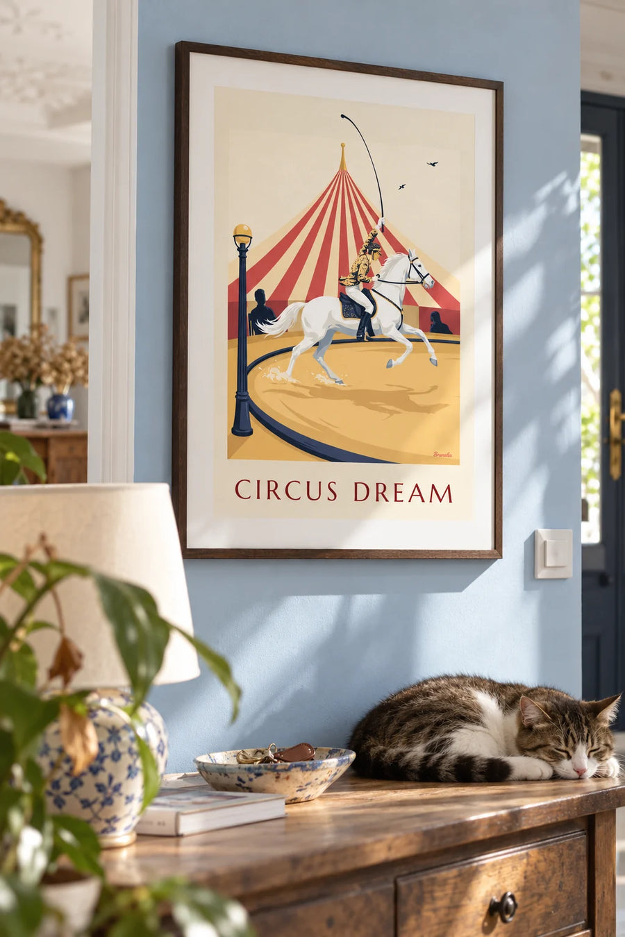 Poster of a female circus rider on a galloping white horse under the big top: framed on the wall