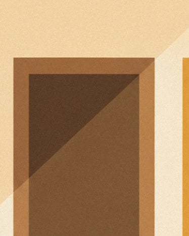 A brown door in a cream wall, crossed by a diagonal shadow