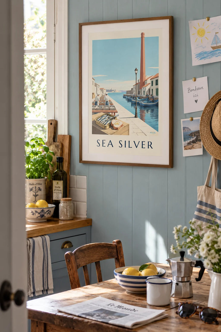 Poster of a tin of sardines in oil and a Breton cannery: framed on the wall