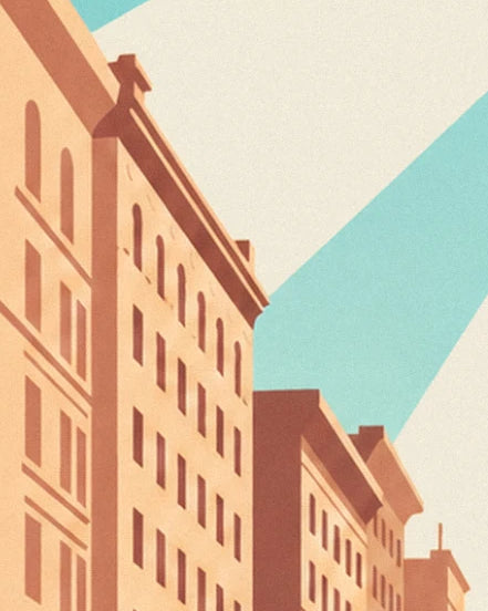 Pinkish stone façade with arched windows, its cornice standing out against the turquoise sky