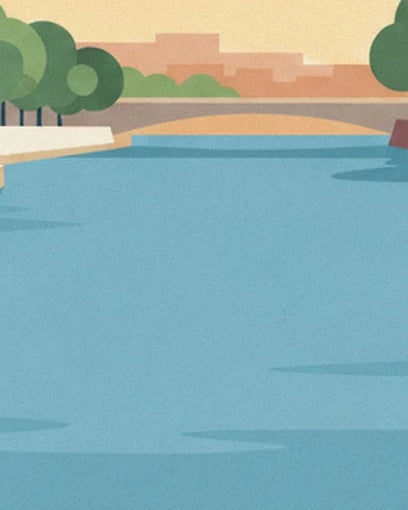 The blue water of the Basse beneath a low bridge between tree-lined quays