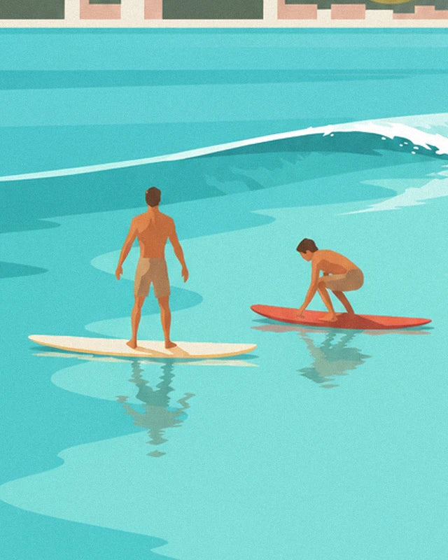 A surfer standing on his cream board and his friend crouching on a red one, on turquoise water