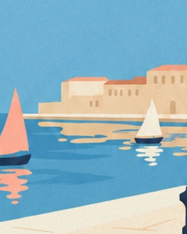 The sailing boats with coral and cream sails facing the ochre seafront façades