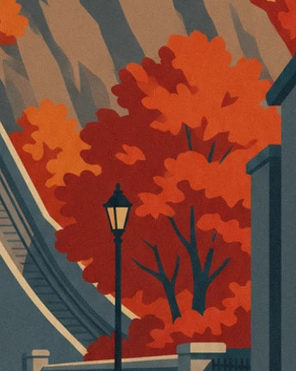 Le réverbère noir devant les arbres rouge orangé et l’escalier à flanc de falaise