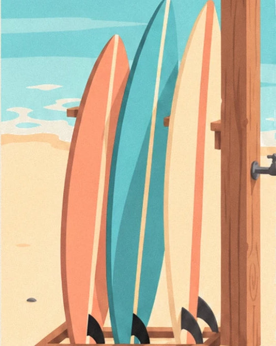 The 3 coral, turquoise and cream surfboards in their wooden rack