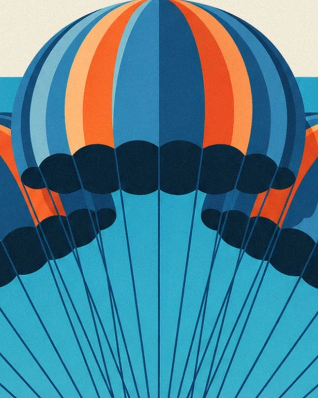 Les parachutes aux bandes bleues et orange, prolongés par leurs fines suspentes