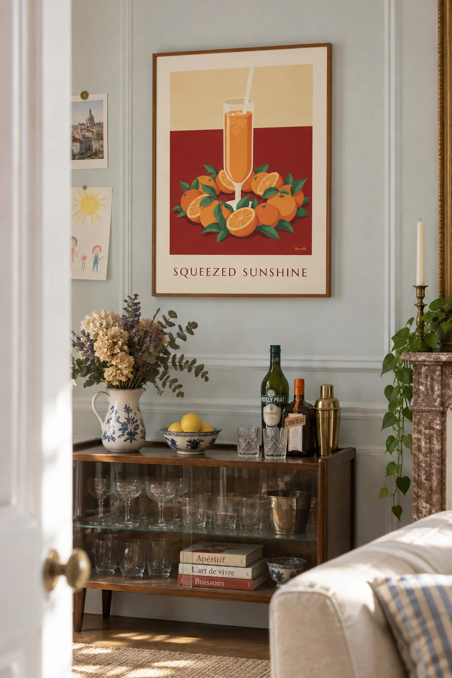 Poster of fresh orange juice and a wreath of oranges: framed on the wall