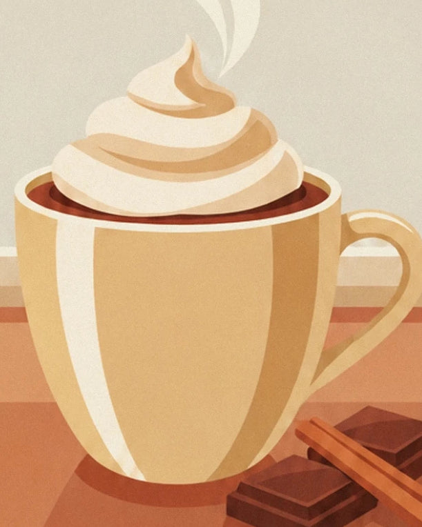 A golden cup of hot chocolate topped with whipped cream, with chocolate and cinnamon