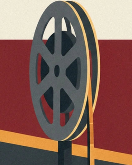 Una gran bobina gris antracita bordeada de película dorada sobre un fondo rojo