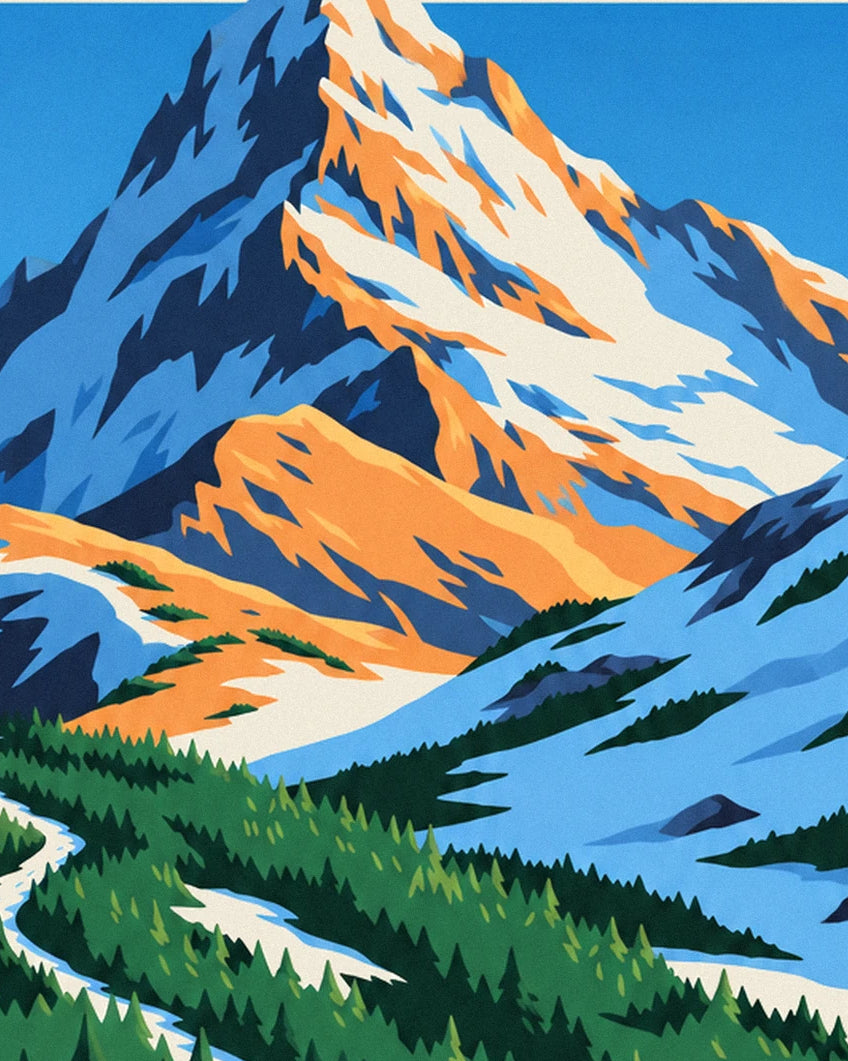 The snowy summit with orange and blue ridges beneath a clear blue sky