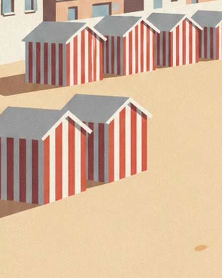 Les cabines de plage rayées de rouge et de blanc, aux toits gris sur le sable doré