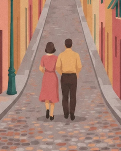 A couple seen from behind, in a pink dress and a yellow shirt, in the cobbled lane