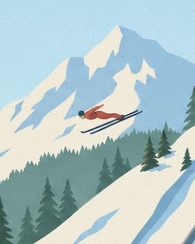 A ski jumper in red in the air in front of the snow-covered peaks of Le Praz