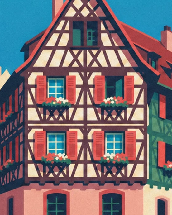 The house with brown timber frames, red shutters and flower-filled windows