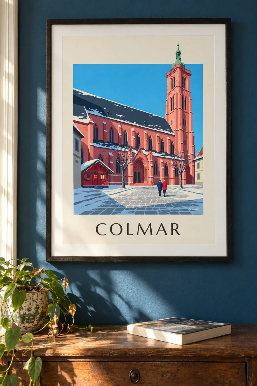 Lámina de la colegiata de San Martín de Colmar en invierno : enmarcado en la pared