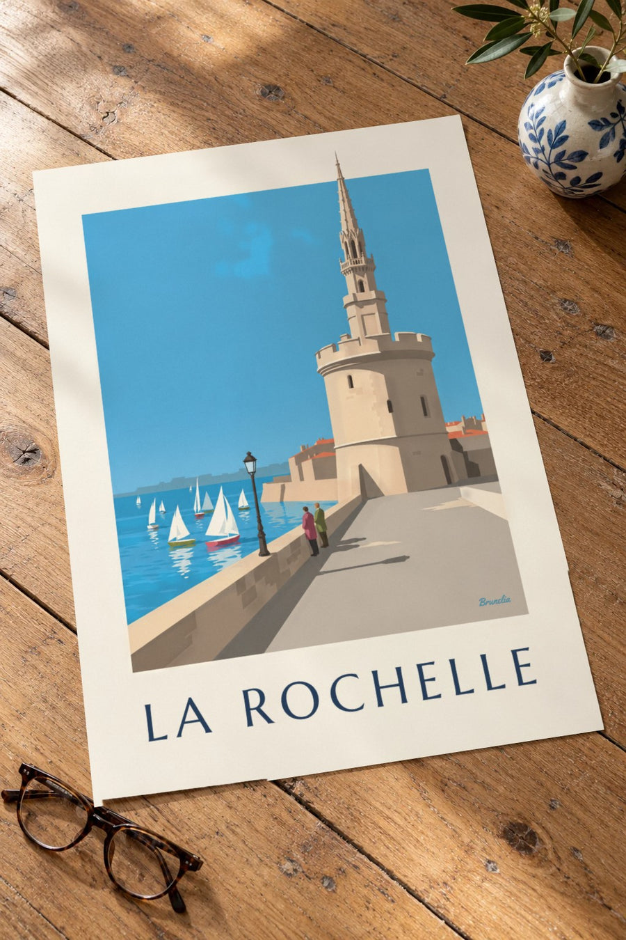 Póster de la Tour de la Lanterne de La Rochelle : apoyado sobre una mesa