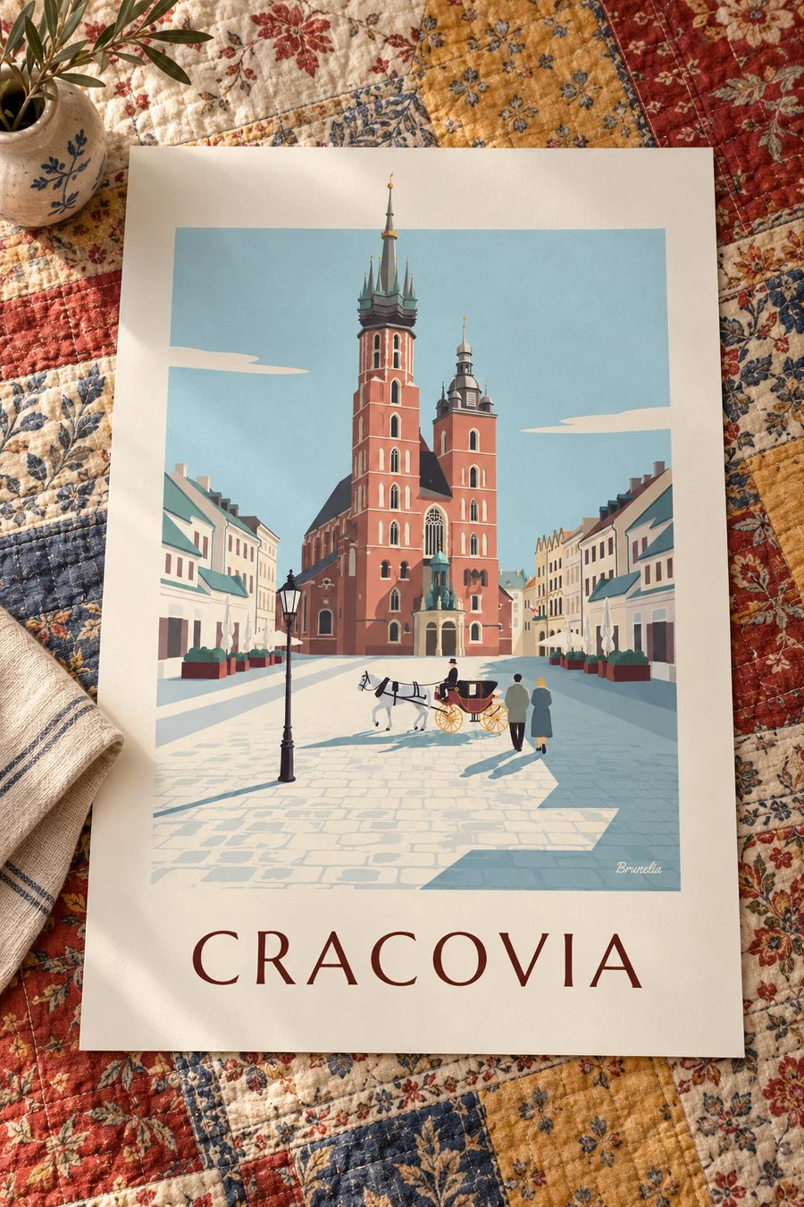 Póster de la basílica de Santa María y un coche de caballos en la plaza de Cracovia: apoyado sobre una mesa