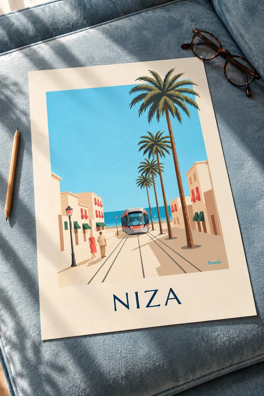 Póster tranvía de Niza y el Mediterráneo: apoyado sobre una mesa