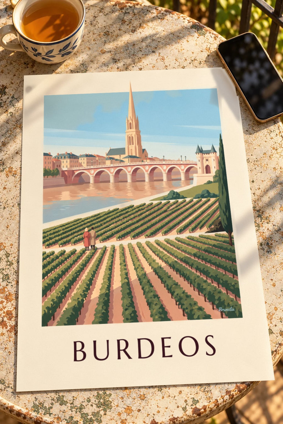 Póster puente de piedra y Porte Cailhau en Burdeos vistos desde los viñedos: apoyado sobre una mesa