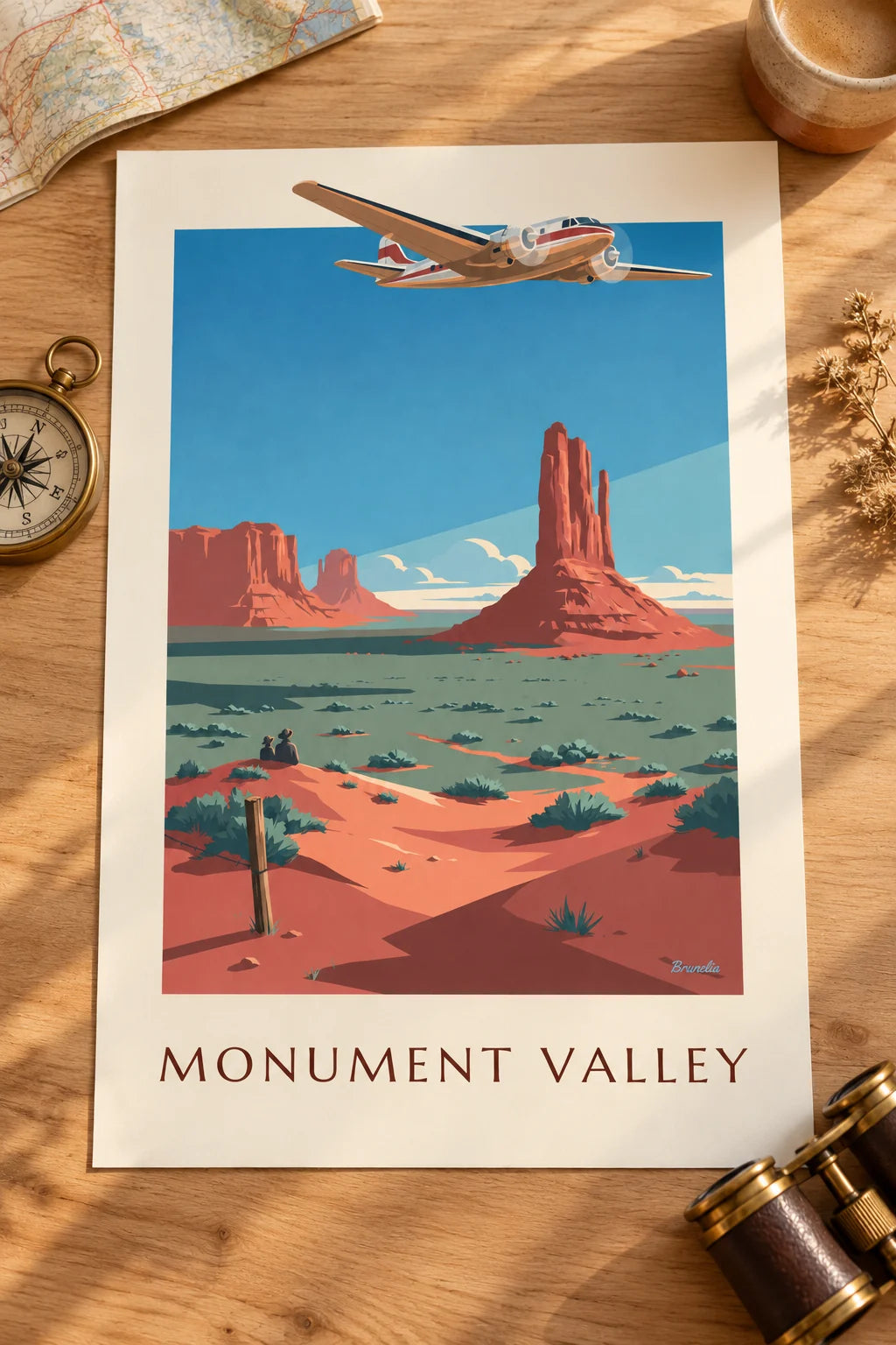 Office: Twin-engine airliner over Monument Valley poster on the wall