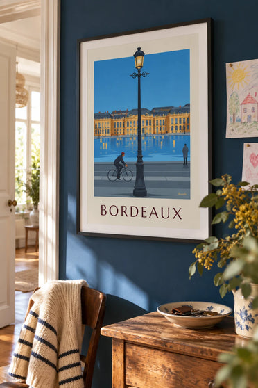 Cyclist in front of Bordeaux’s Miroir d’eau at dusk poster: framed on the wall