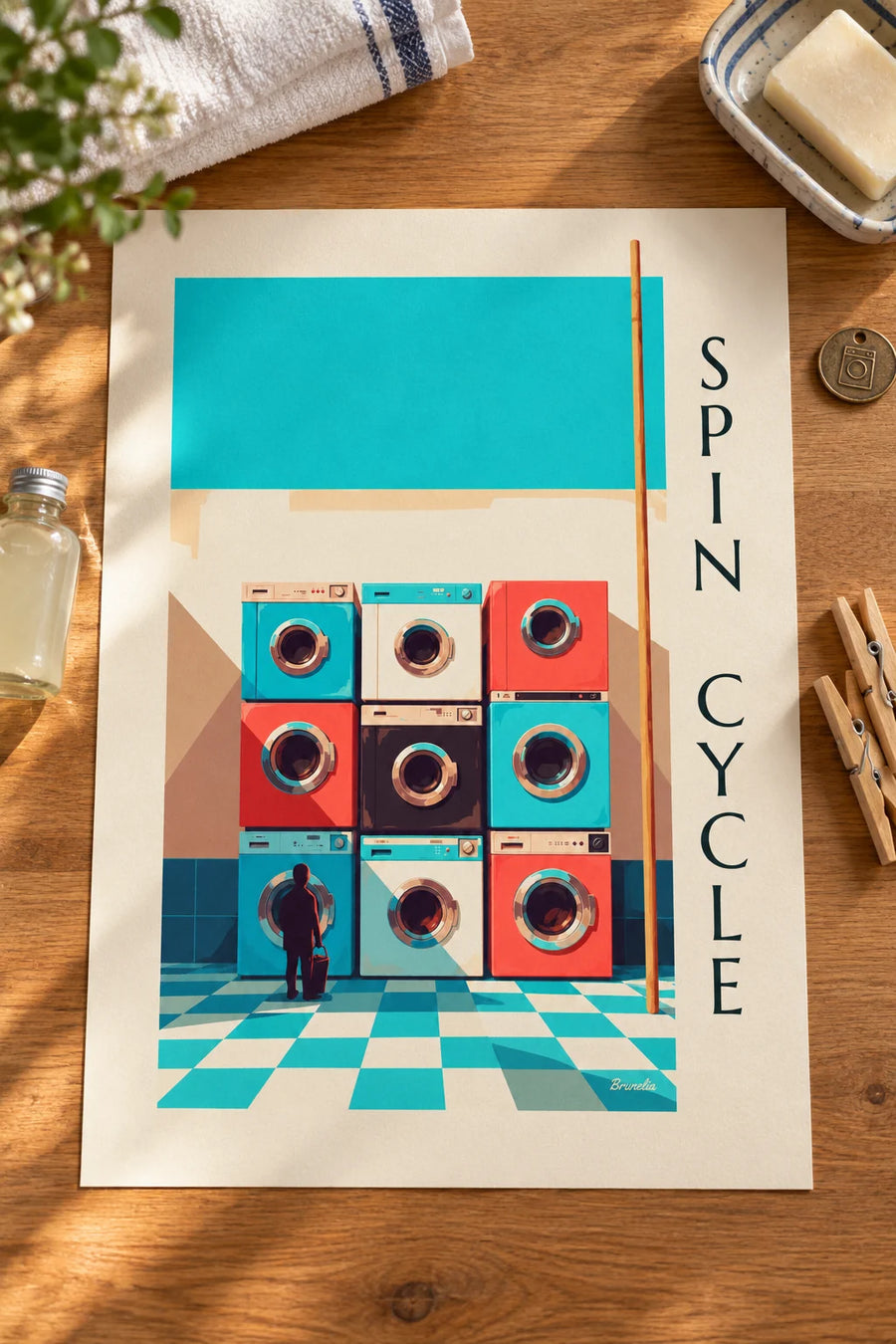 Póster con cuadrícula de 9 lavadoras de colores : apoyado sobre una mesa