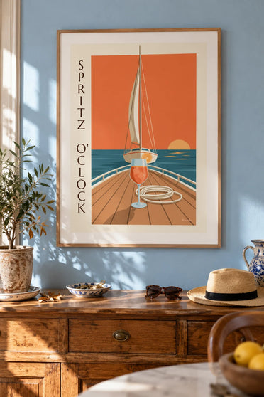 Affiche spritz sur le pont d'un voilier au coucher du soleil : encadrée au mur