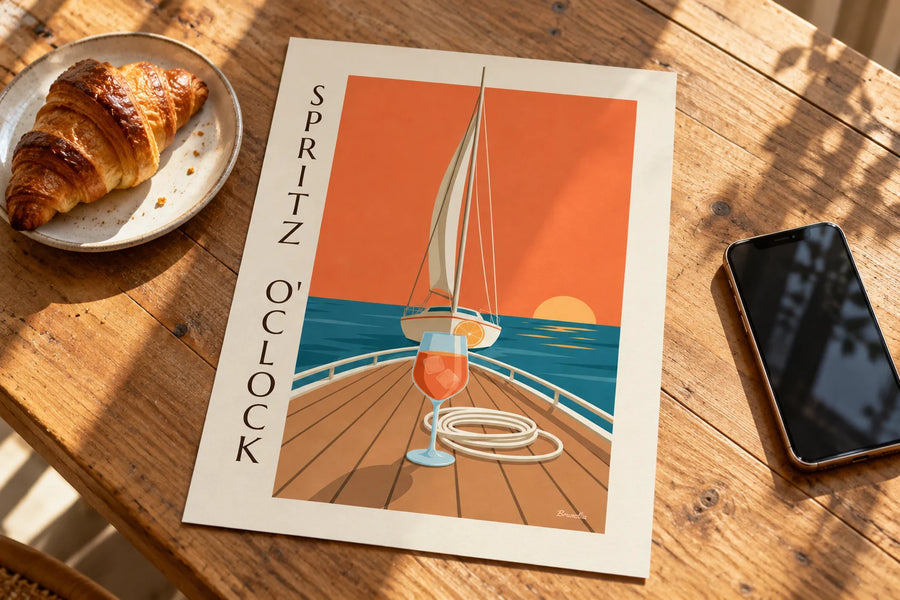 Póster de un spritz en la cubierta de un velero al atardecer: apoyado sobre una mesa