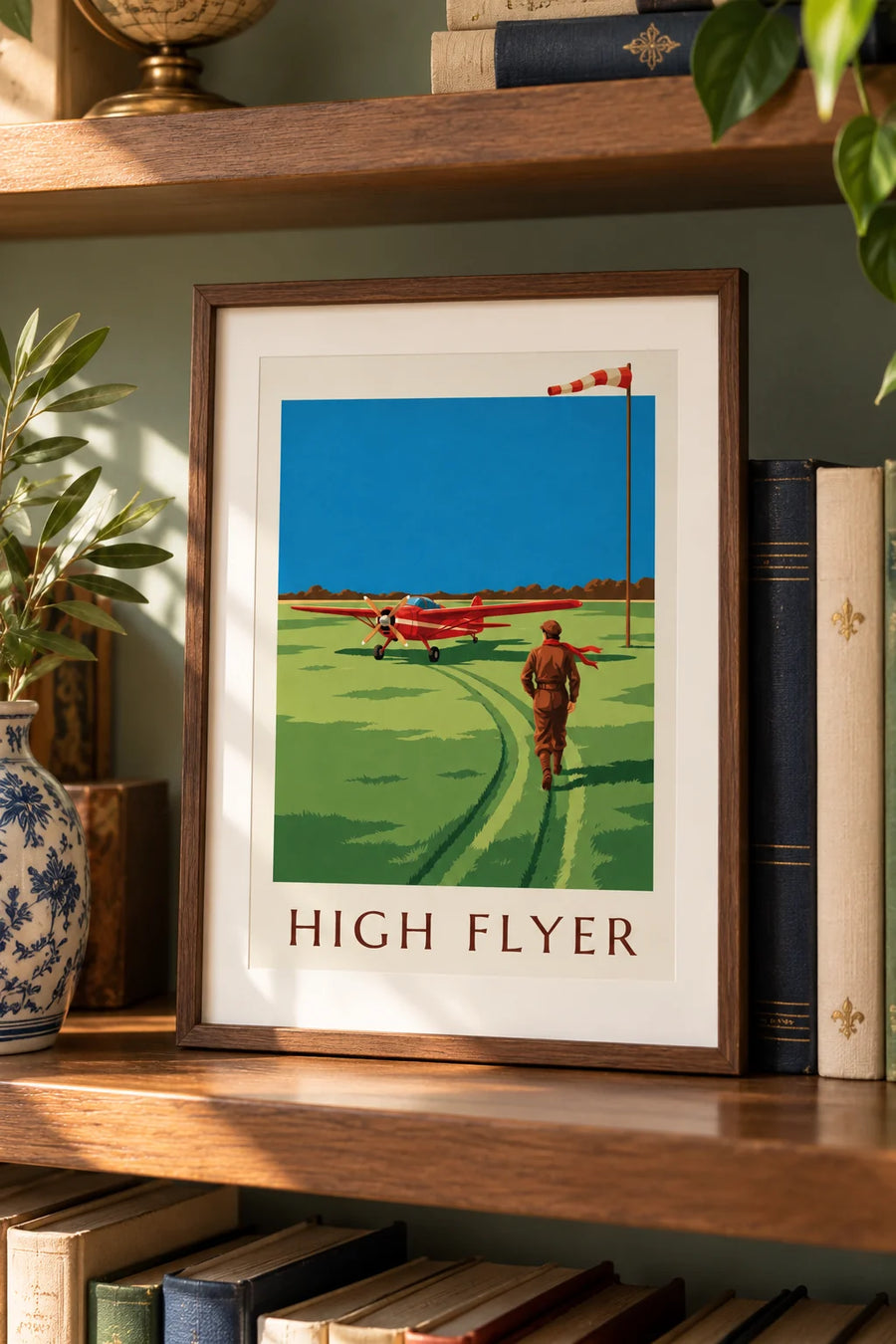 Affiche aviatrice et avion à hélice rouge sur une piste en herbe : petit format A4 encadré