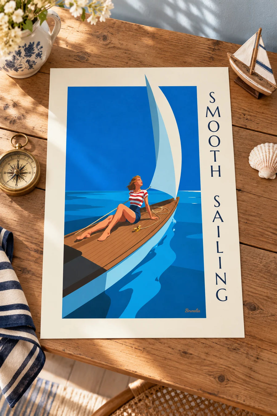Póster de una pin-up en la cubierta de un velero en alta mar: apoyado sobre una mesa
