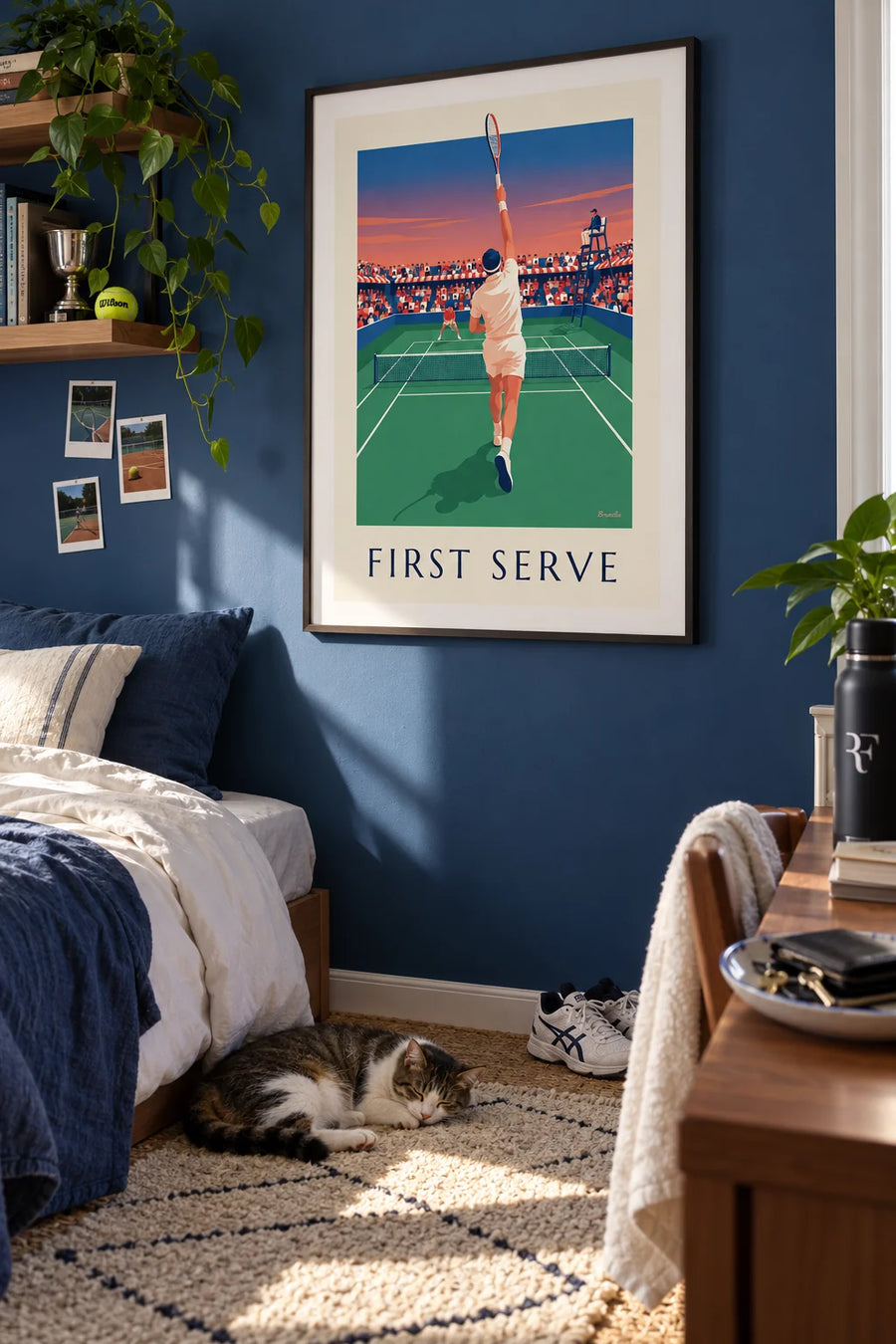 Poster of a tennis player serving on grass at a tournament: framed on the wall