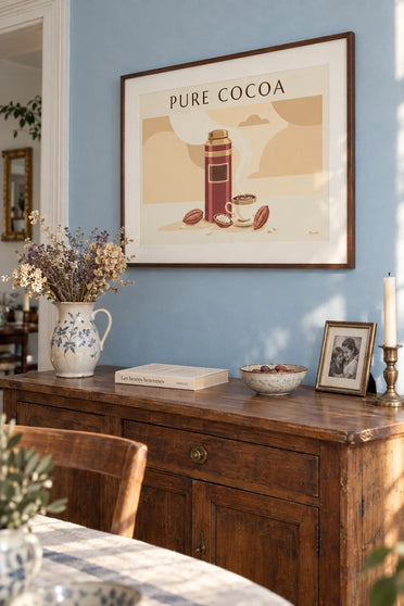 Poster of a cocoa tin and a cup of hot chocolate: framed on the wall